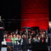 Lipscomb president Dr. Candice McQueen on stage with Amy Grant at Lighting of the Green in 2023