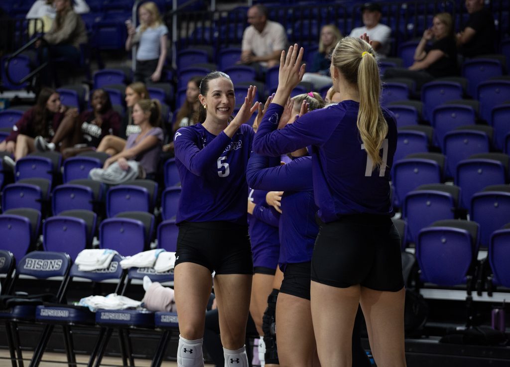 Gr. Lexi Guinn celebrates with team.