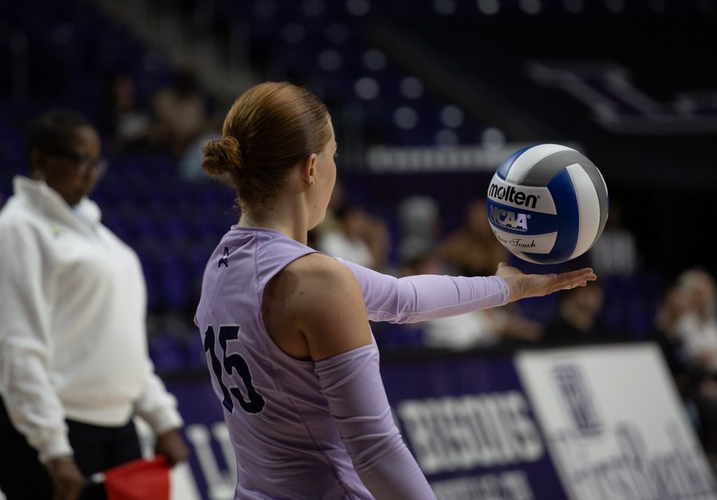 Fr. Grace Jones prepares to serve.