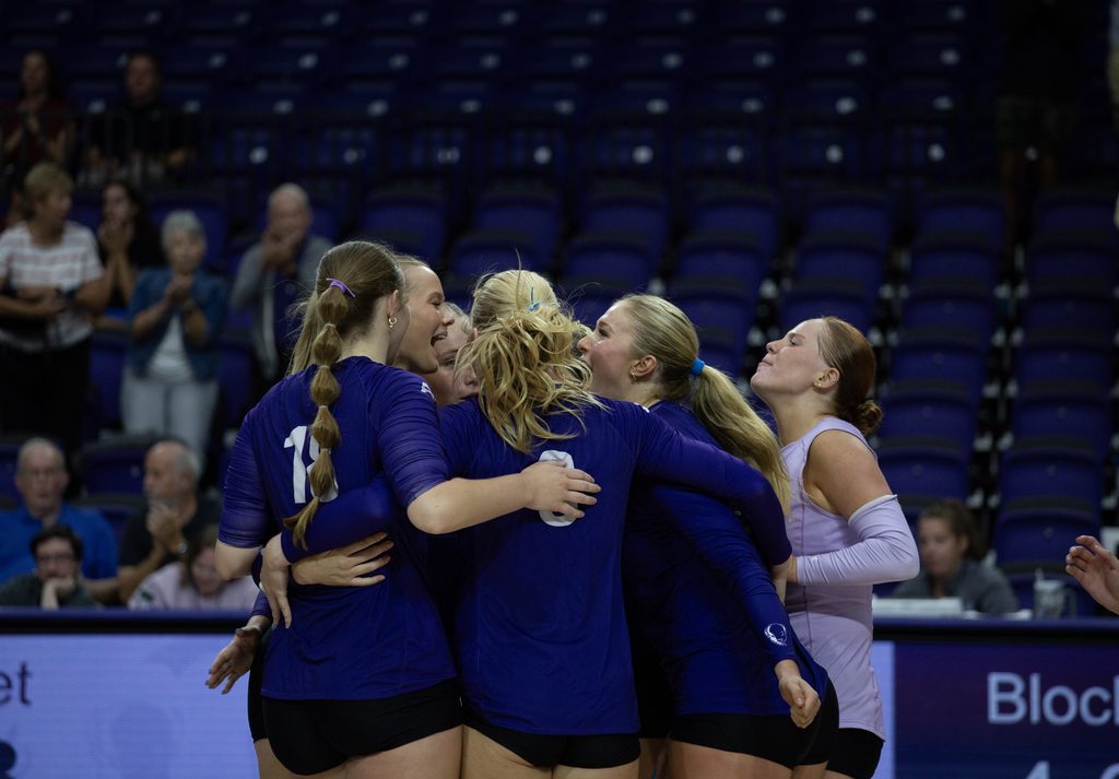 Bisons Celebrate game winning block by Sr. Brooklyn Fuchs.