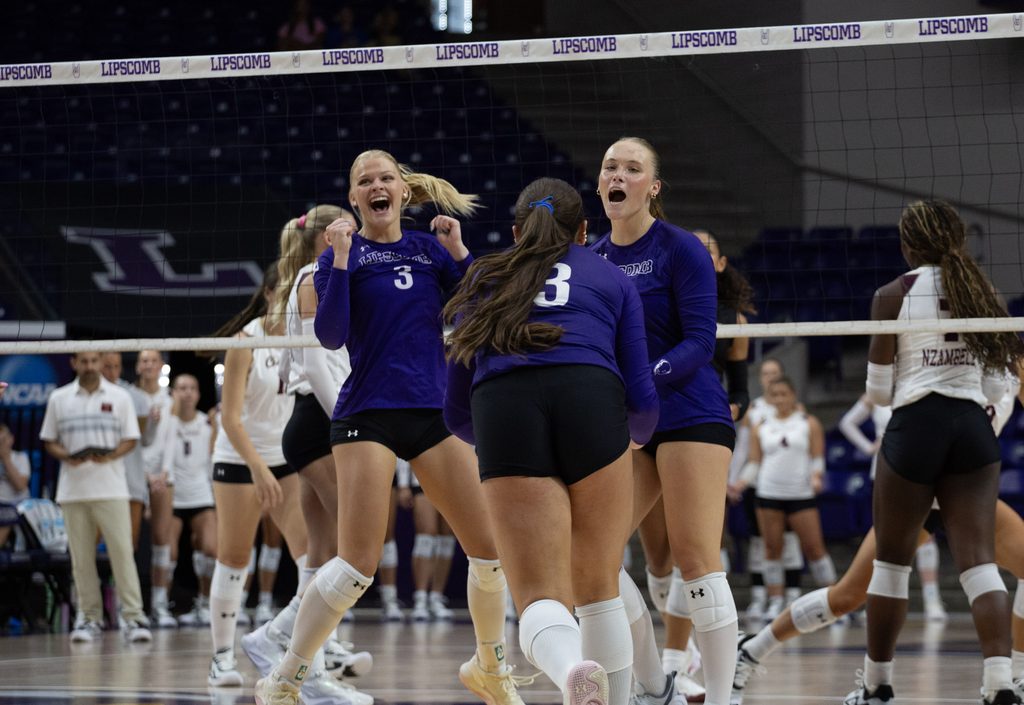 Bisons celebrate the block.